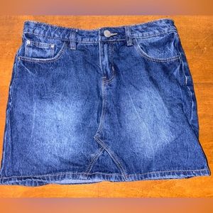 Mini denim skirt from Refuge. Waist size measures 28 in.